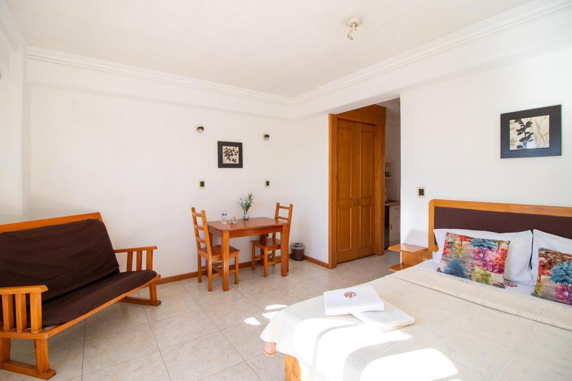Suites Sevilla Πουέμπλα Εξωτερικό φωτογραφία
