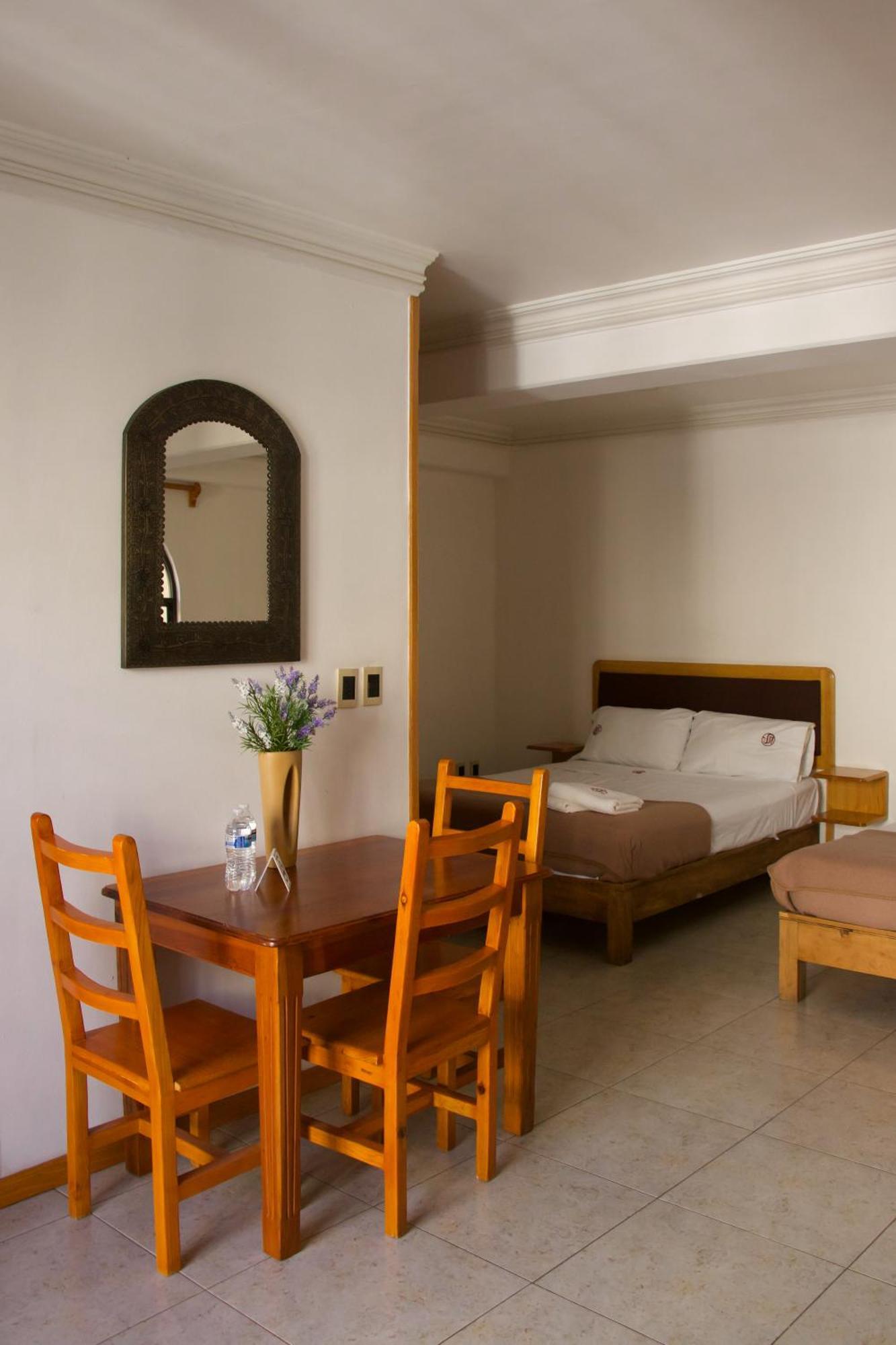 Suites Sevilla Πουέμπλα Εξωτερικό φωτογραφία