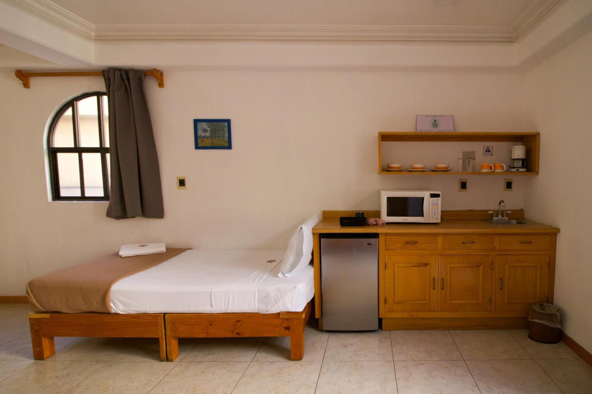 Suites Sevilla Πουέμπλα Εξωτερικό φωτογραφία