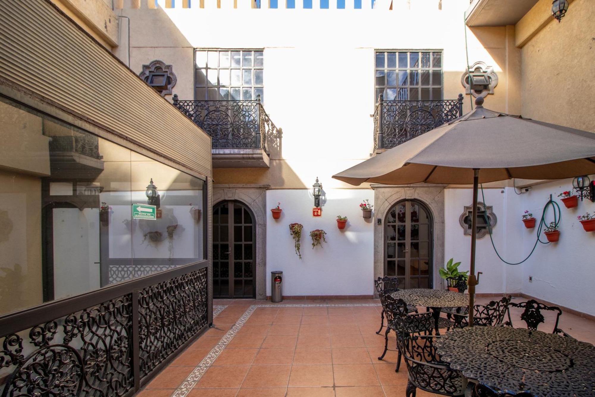 Suites Sevilla Πουέμπλα Εξωτερικό φωτογραφία