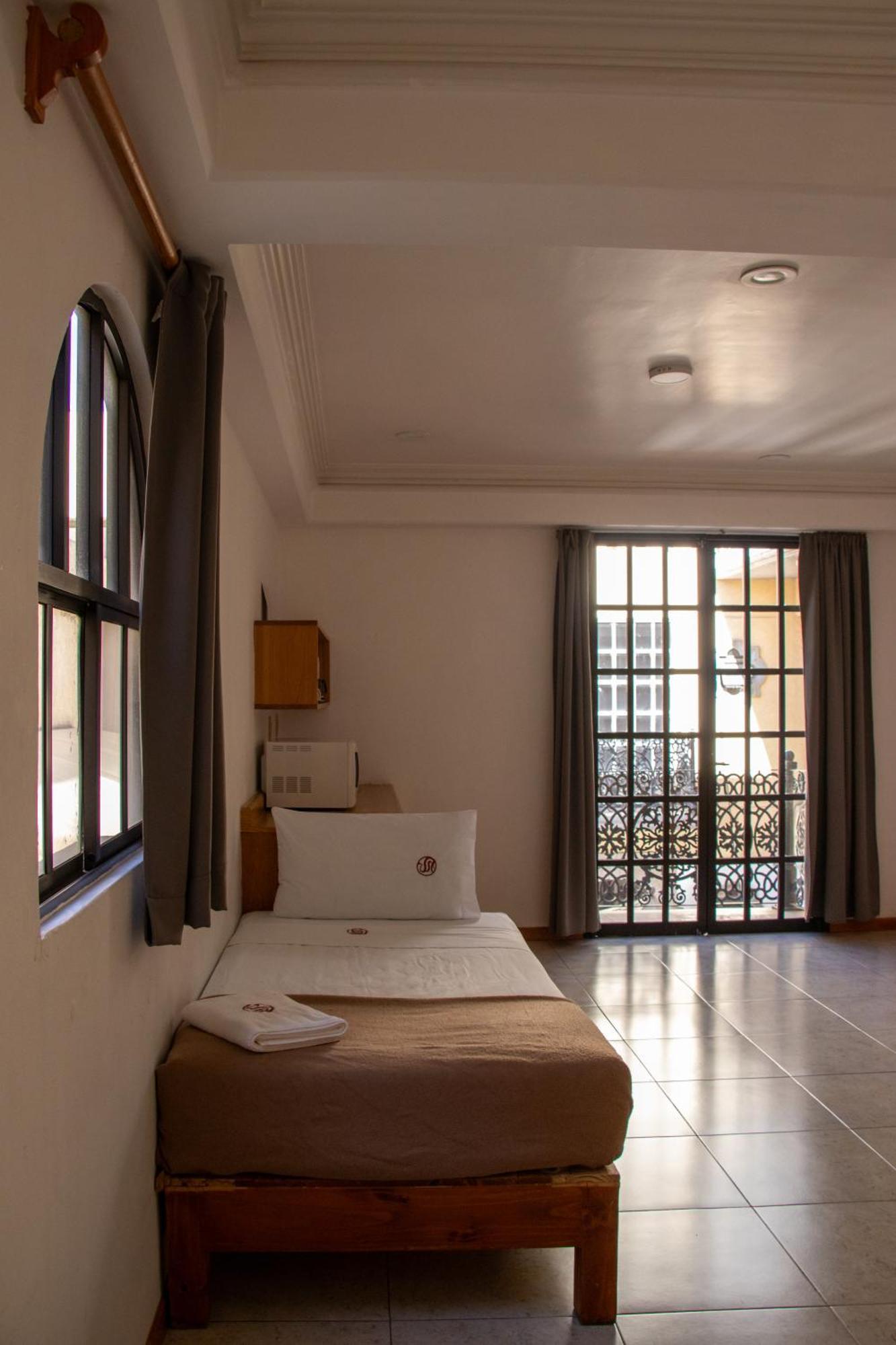 Suites Sevilla Πουέμπλα Εξωτερικό φωτογραφία