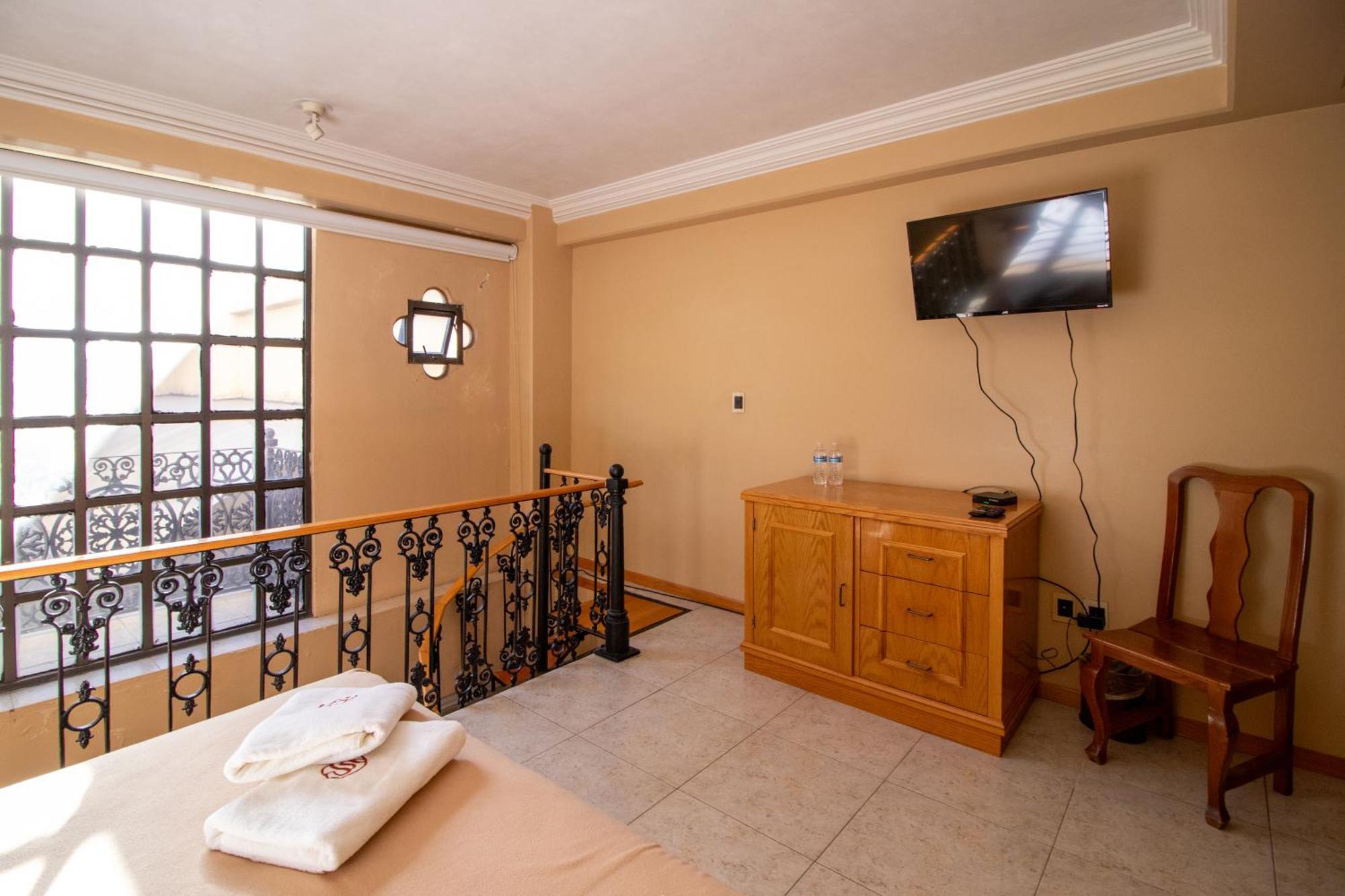 Suites Sevilla Πουέμπλα Εξωτερικό φωτογραφία