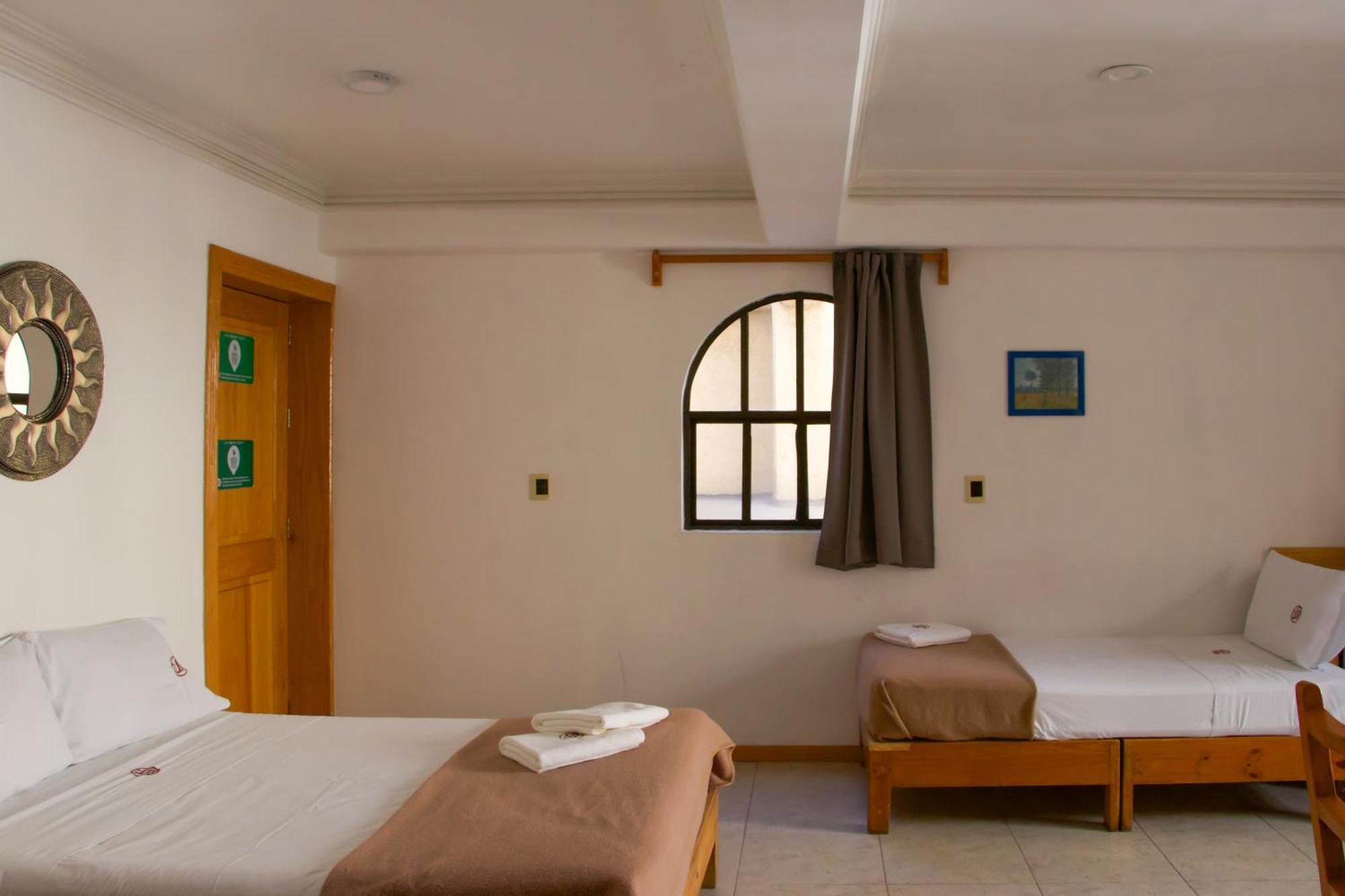 Suites Sevilla Πουέμπλα Εξωτερικό φωτογραφία