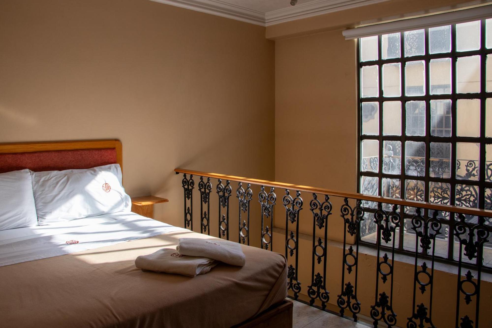 Suites Sevilla Πουέμπλα Εξωτερικό φωτογραφία